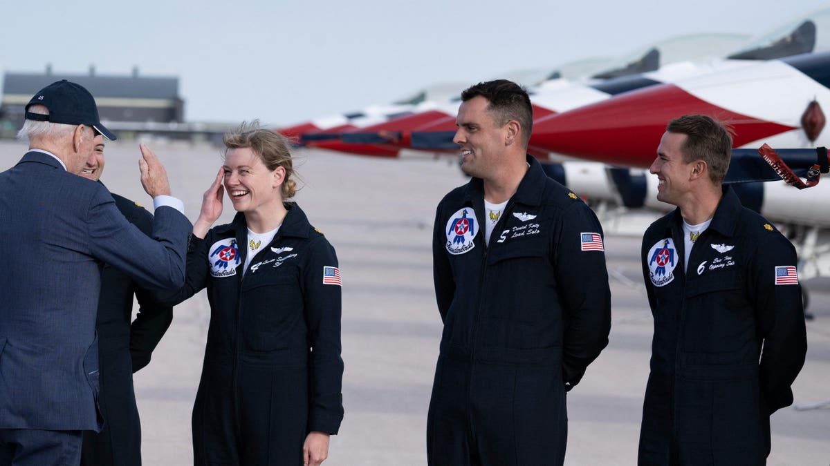 The President of the United States, Biden, greets the United States Air Force riders at the base of Peterson's spatial force in Colorado Springs, Colorado, on May 31, 2023.