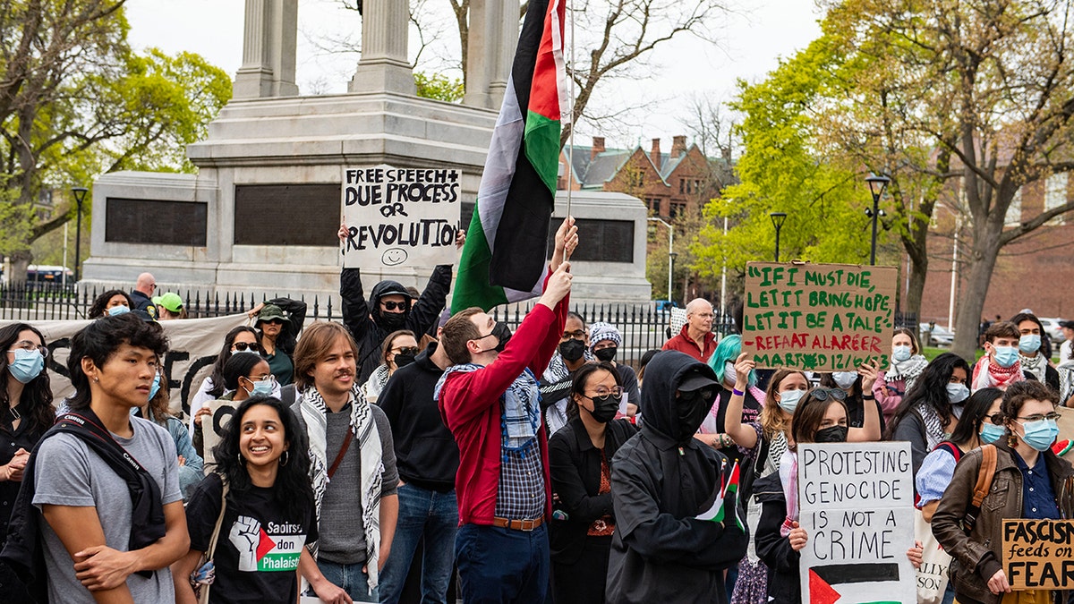 Harvard Prester Waves Flag Palestinian