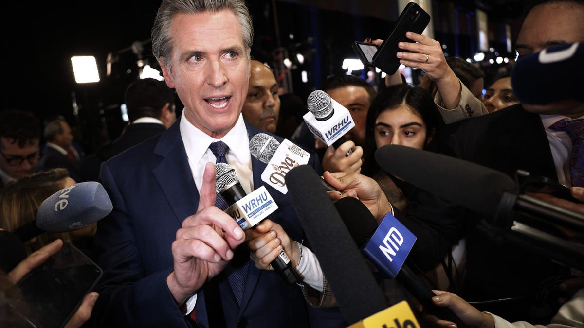 Newsom talking to journalists